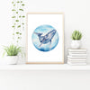 Humpback Whale art print in oak frame with indoor plants and books. Watercolour art print from Artista Style